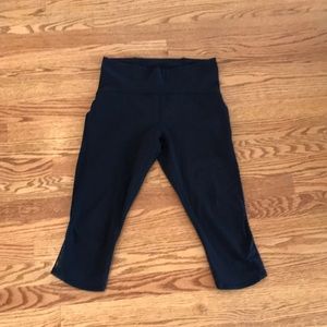 Lululemon Black athletic pants with mesh siding. Size 8